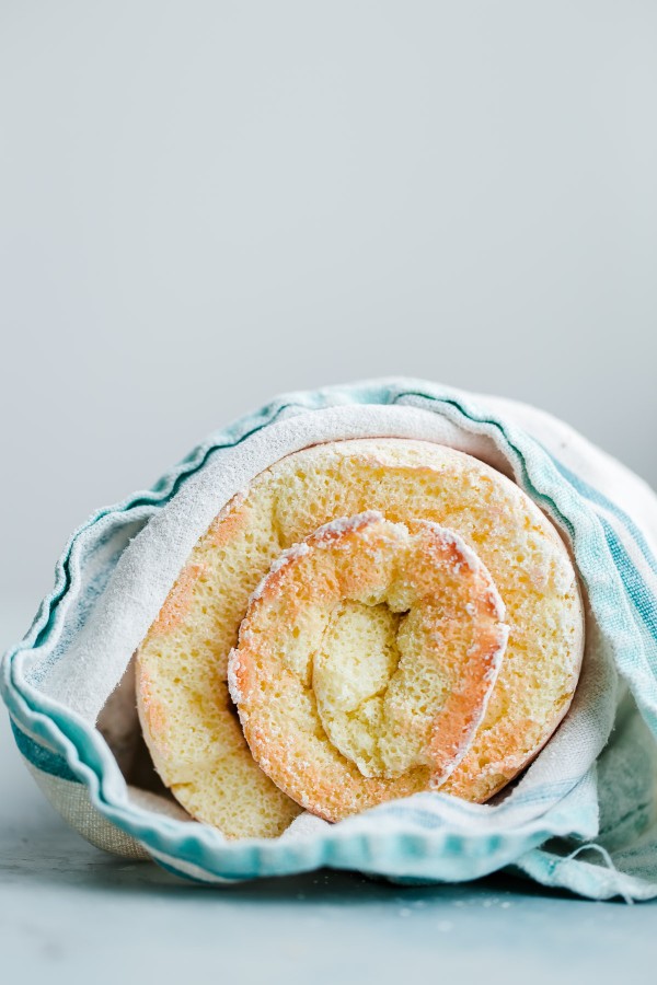 Sponge Roll Cake in Kitchen Towel