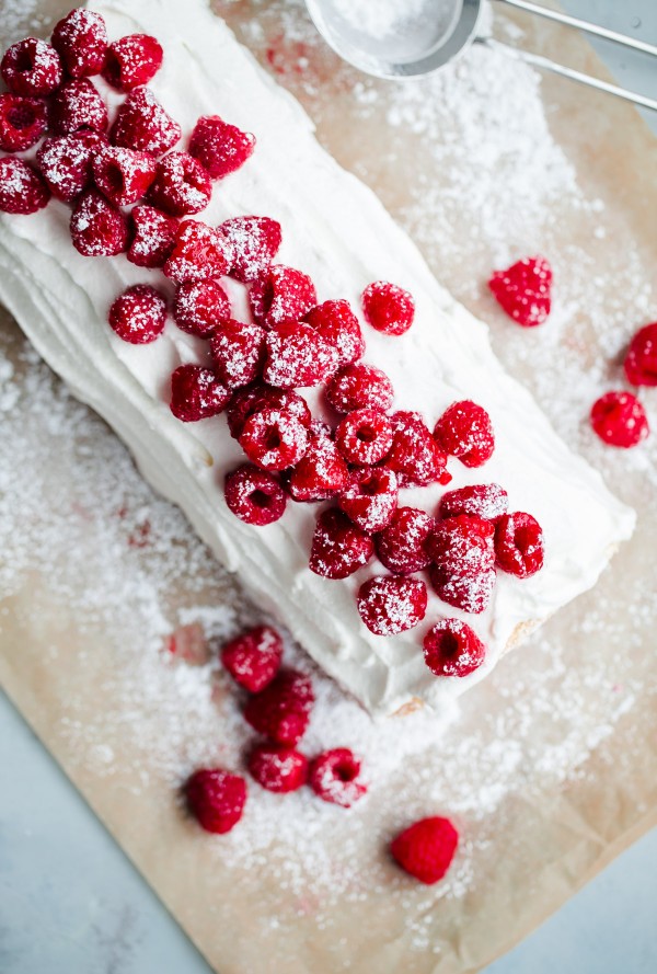 Raspberry Roll Cake topped with Fresh Raspberries 