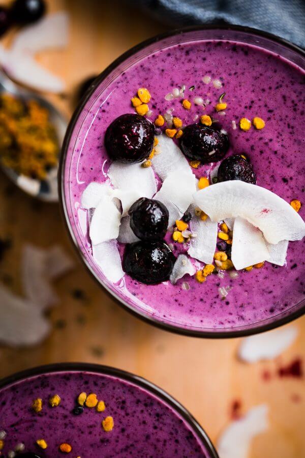 Simple Berry Smoothie - a healthy, vibrant smoothie made with frozen blueberries, greek yogurt, coconut water, banana, and my favorite smoothie ingredient: almond butter. 