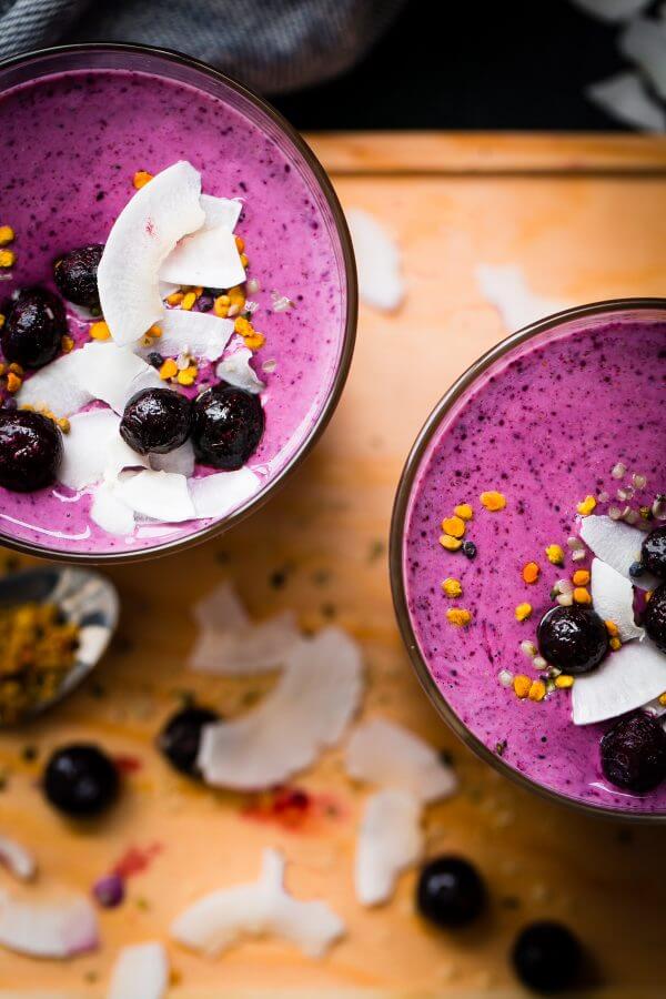 Simple Berry Smoothie - a healthy smoothie made with frozen blueberries, greek yogurt, coconut water, banana, and my favorite smoothie ingredient: almond butter. 