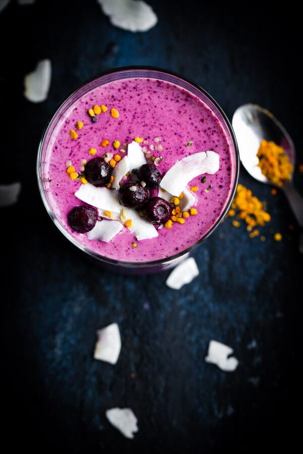 Simple Berry Smoothie - made with greek yogurt, frozen berries, coconut water, and my favorite smoothie addition: almond buttter. 