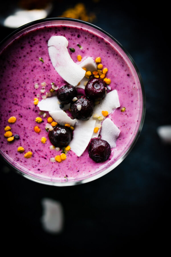 Simple Berry Smoothie - a healthy, vibrant smoothie made with frozen blueberries, greek yogurt, coconut water, banana, and my favorite smoothie ingredient: almond butter. 