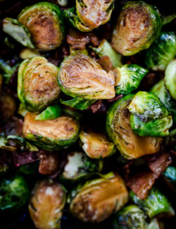 Maple Bacon Brussels Sprouts. Sweet and salty Brussels sprouts side dish with crispy bacon, balsamic vinegar, and maple syrup!