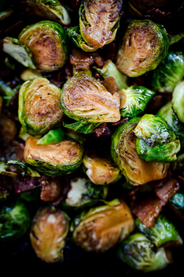Maple Bacon Brussels Sprouts. Sweet and salty Brussels sprouts side dish with crispy bacon, balsamic vinegar, and maple syrup!