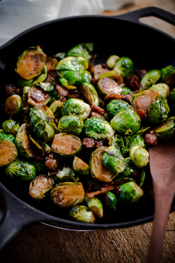 Maple Bacon Brussels Sprouts. Sweet and salty Brussels sprouts side dish with crispy bacon, balsamic vinegar, and maple syrup! 