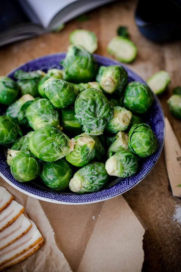 Maple Bacon Brussels Sprouts. Sweet and salty Brussels sprouts side dish with crispy bacon, balsamic vinegar, and maple syrup!