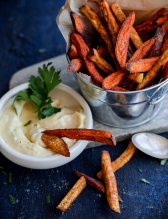 Crispy Baked Spiced Sweet Potato Fries with Garlic Aioli. A comforting fall appetizer or snack!