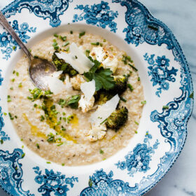 Quinoa Risotto with White Beans. This easy and healthy main course recipe is made creamy with white bean puree and topped with crispy brassica florets!