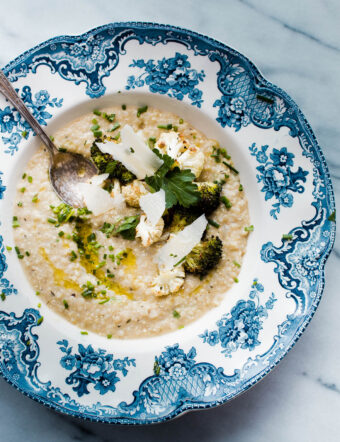 Quinoa Risotto with White Beans. This easy and healthy main course recipe is made creamy with white bean puree and topped with crispy brassica florets!