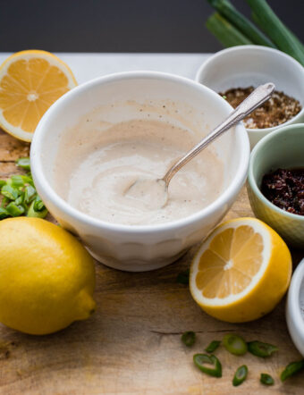 EASY Lemon Tahini Sauce made with just two ingredients! Use on grilled vegetables, chicken, meat, seafood, or thin it down and use a simple salad dressing.