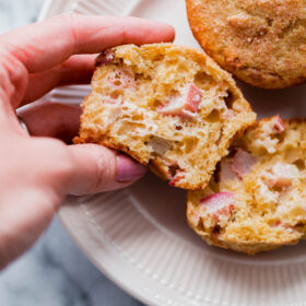 Easy Rhubarb Muffins - rhubarb muffin recipe made with whole grain flour, studded with rhubarb pieces, and sweetened with maple syrup!