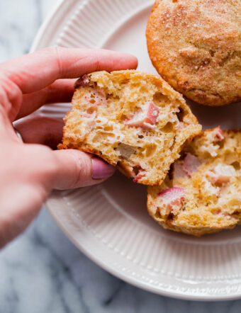 Easy Rhubarb Muffins - rhubarb muffin recipe made with whole grain flour, studded with rhubarb pieces, and sweetened with maple syrup!