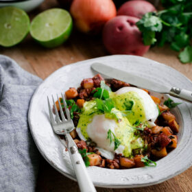 Chorizo and Potato Hash Eggs Benedict with Cilantro Hollandaise