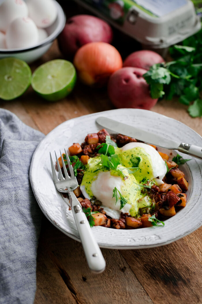 Chorizo and Potato Hash Eggs Benedict with Cilantro Hollandaise