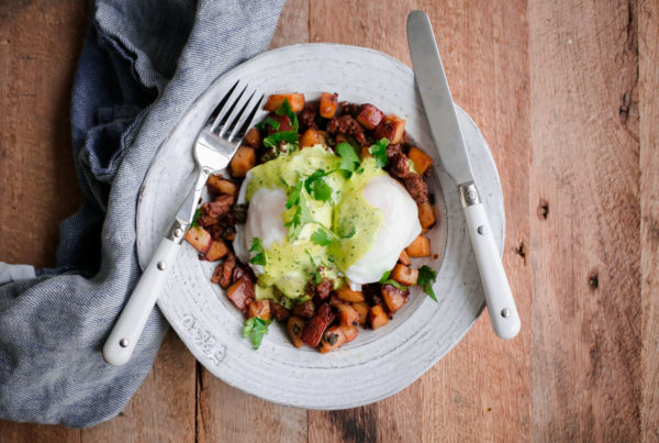 Chorizo and Potato Hash Eggs Benedict with Cilantro Hollandaise