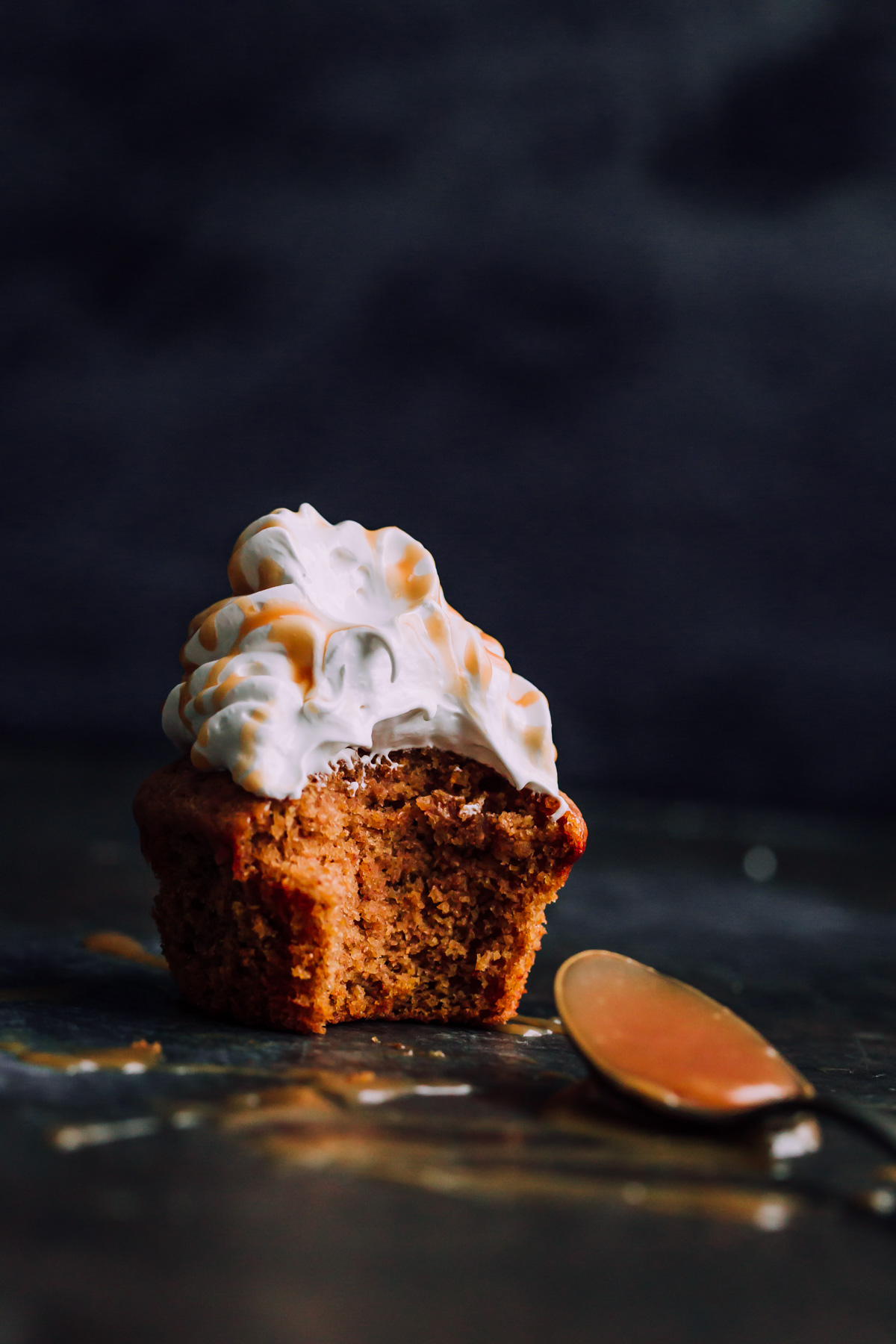 Pumpkin Cupcakes with Marshmallow Frosting and Caramel. This decadent fall cupcakes are lightly spiced and make a wonderful portable fall dessert.