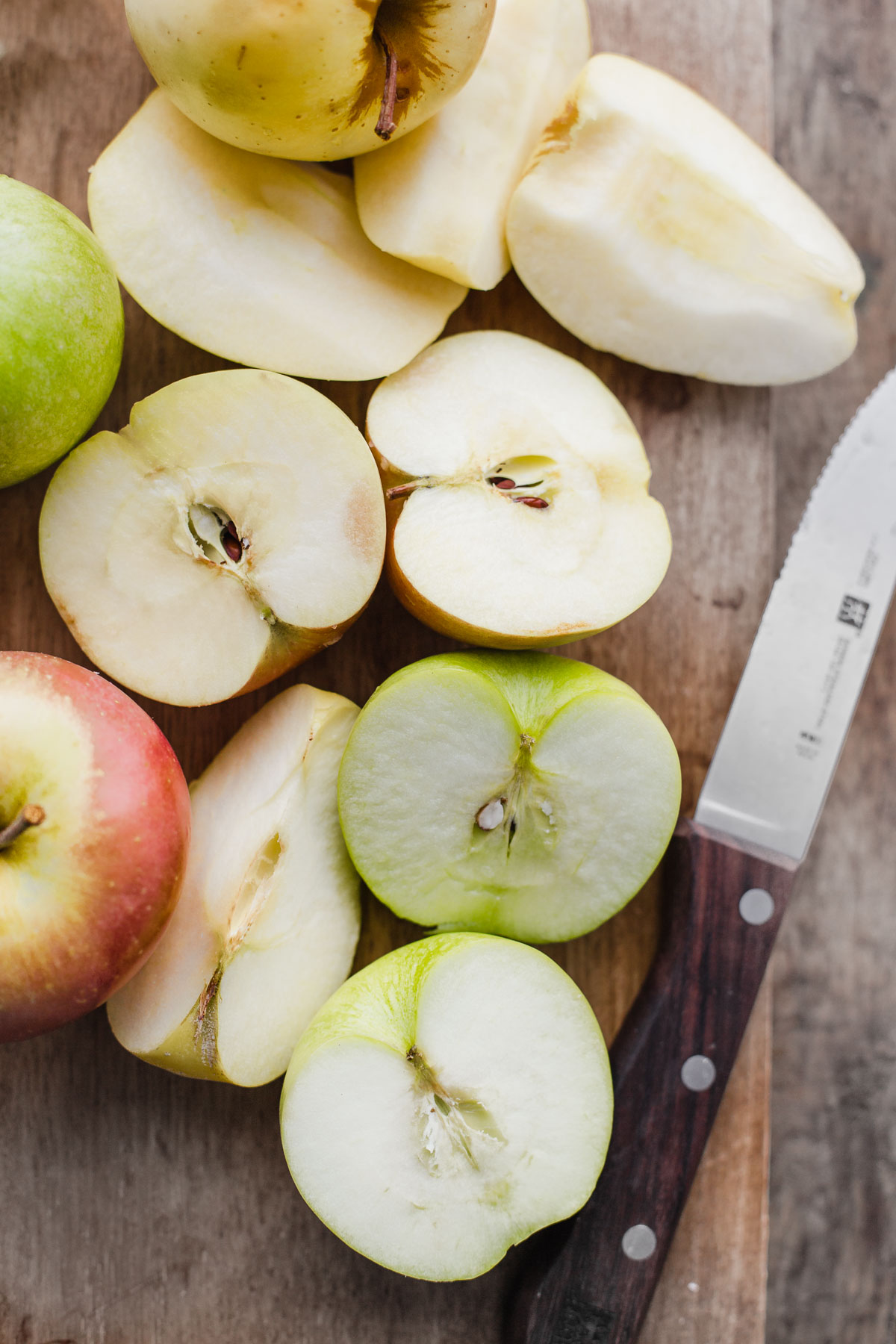 Instant Pot Apple Sauce - this EASY pressure cooker apple sauce recipe contains zero added sugar, requires zero peeling, and can be made in less than 30 minutes! Serve it with Greek yogurt and granola for a healthy breakfast. #instantpot #applesauce #apple