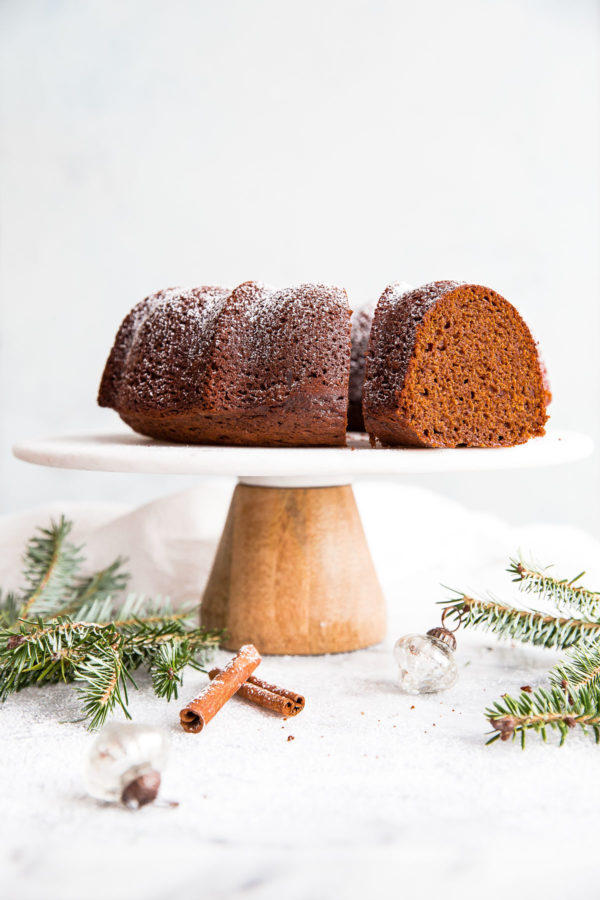 Gingerbread Bundt Cake - a festive gingerbread cake recipe for the holidays. Served with eggnog whipped cream.