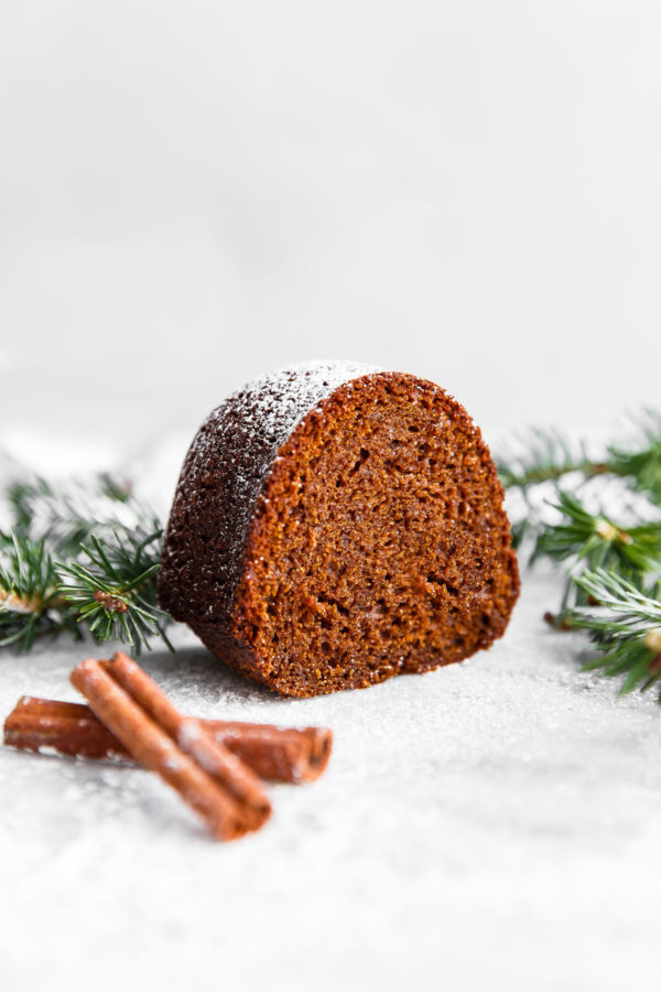 Gingerbread Bundt Cake - this easy, perfectly spiced MOIST bundt cake is served with an eggnog whipped cream. A festive cake recipe for the holiday season!