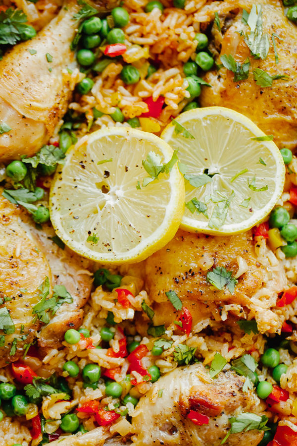 Arroz Con Pollo - an easy, comforting ONE pot meal that comes together in less than 45 minutes. This classic Spanish and Mexican dish is made with rice, chicken, bell peppers, and spices.