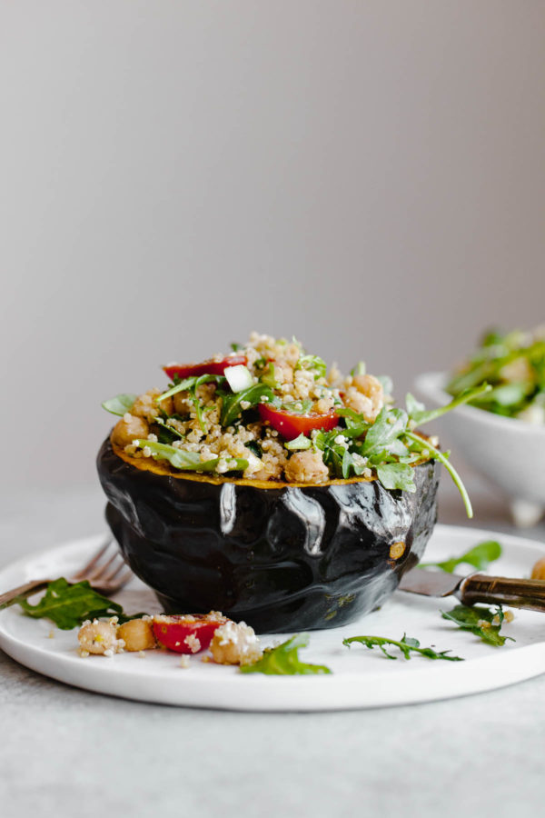 Roasted Acorn Squash Half Filled with Mediterranean Quinoa Salad