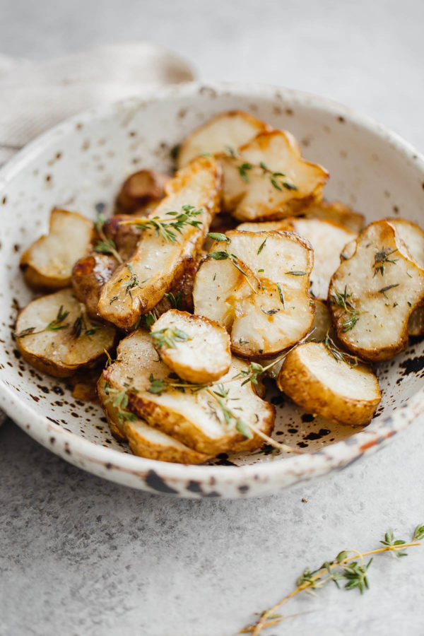 Roasted Sunchokes with Herbs in a Bowl 