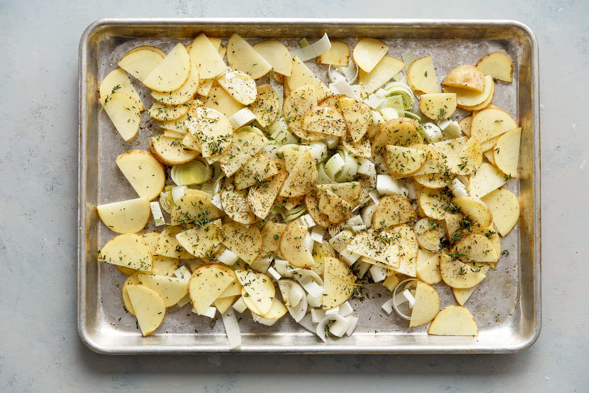 Sliced Potatoes and Leeks on a Sheet Pan