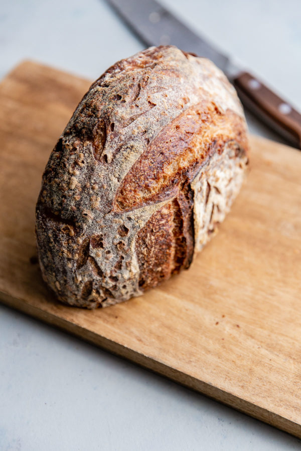 Bread Face Down on Cutting Board