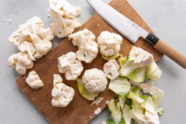 Cauliflower Florets on Cutting Board