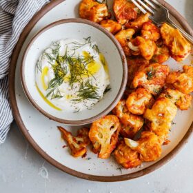 Baked Buffalo Cauliflower with Yogurt Dipping Sauce