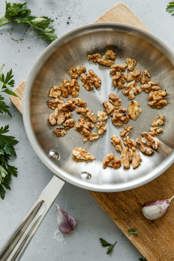 Toasted Walnuts in a Skillet