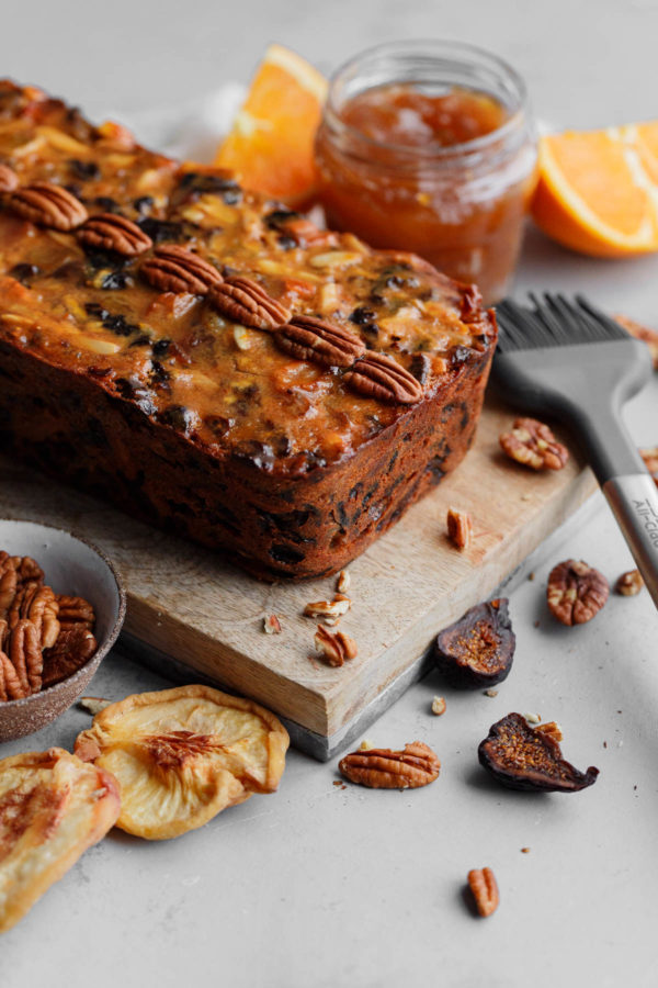 Moist Fruit Cake Topped with Whole Pecans and Apricot Glaze