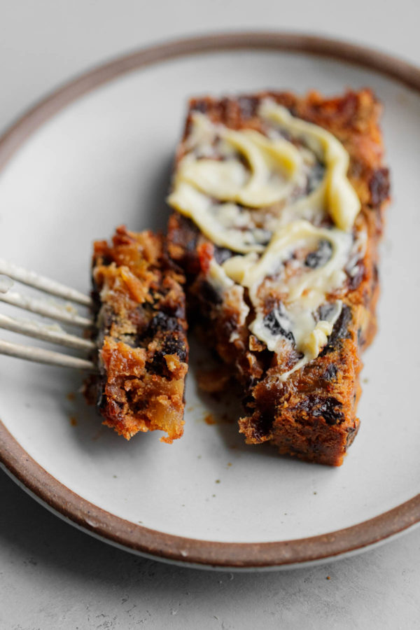 Fruit Cake on Plate Smeared with Salted Butter