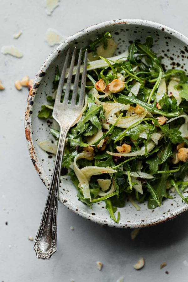 Shaved Fennel Arugula Salad with Hazelnuts, Parmesan, and Sherry Vinaigrette