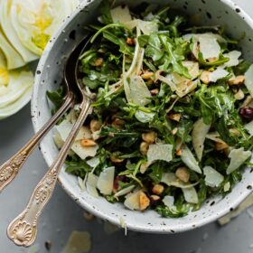 Shaved Fennel Arugula Salad with Hazelnuts, Parmesan, and Sherry Vinaigrette