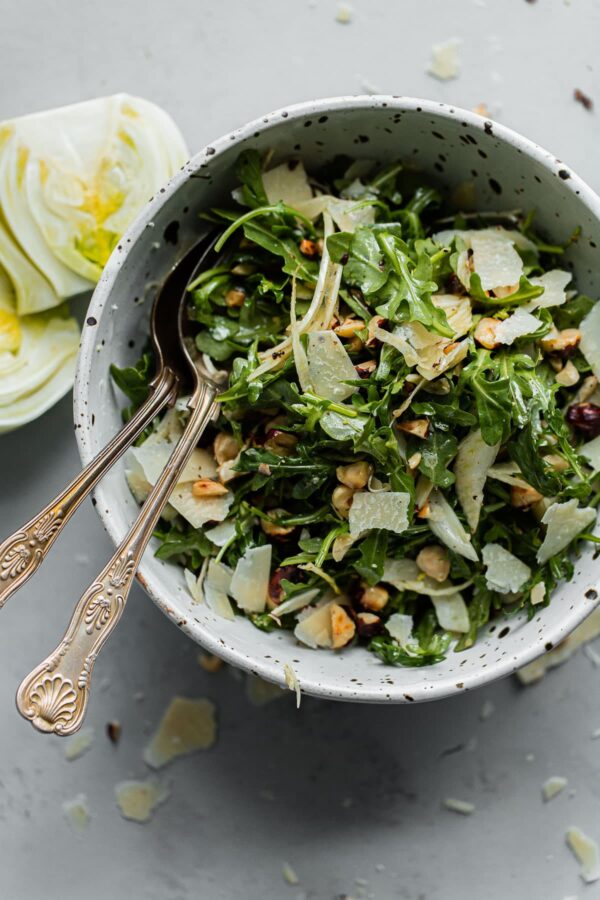 Shaved Fennel Arugula Salad with Hazelnuts, Parmesan, and Sherry Vinaigrette