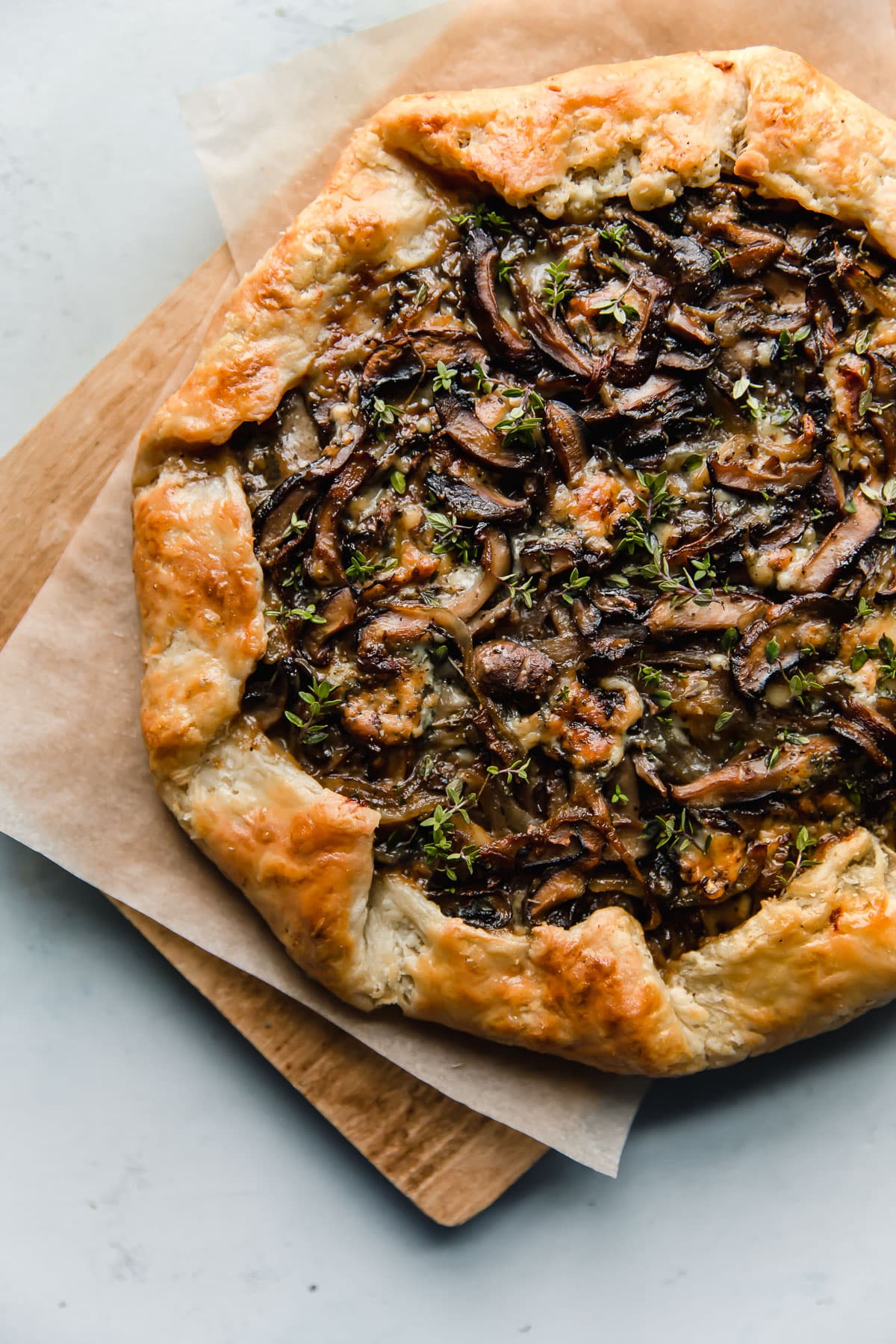 Mushroom Galette with Blue Cheese on Cutting Board