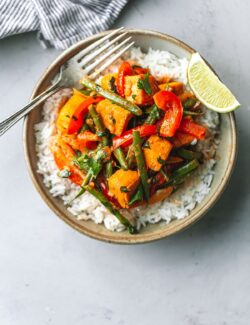 Bowl with Tofu Thai Red Curry and Fork