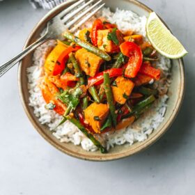 Bowl with Tofu Thai Red Curry and Fork