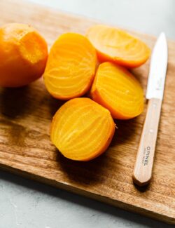 Cooked Yellow Beets on Cutting Board