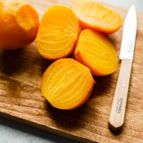 Cooked Yellow Beets on Cutting Board