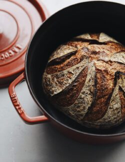 Baked Sourdough Bread Loaf in Staub Dutch Oven