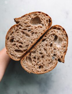 Open Crumb Sourdough Bread Loaf Sliced in Half