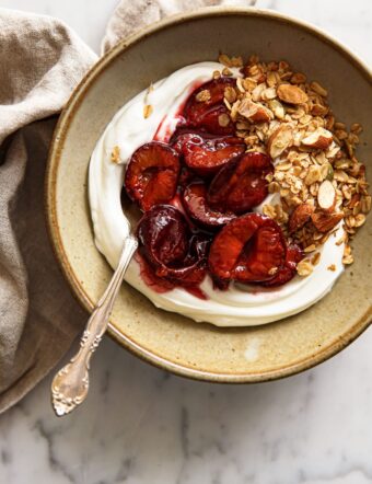 Roasted Plum Compote with Yogurt in Ceramic Bowl