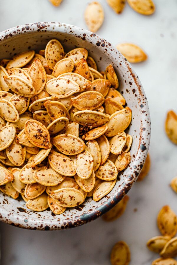 Za'atar Roasted Pumpkin Seeds in Speckled Ceramic Bowl