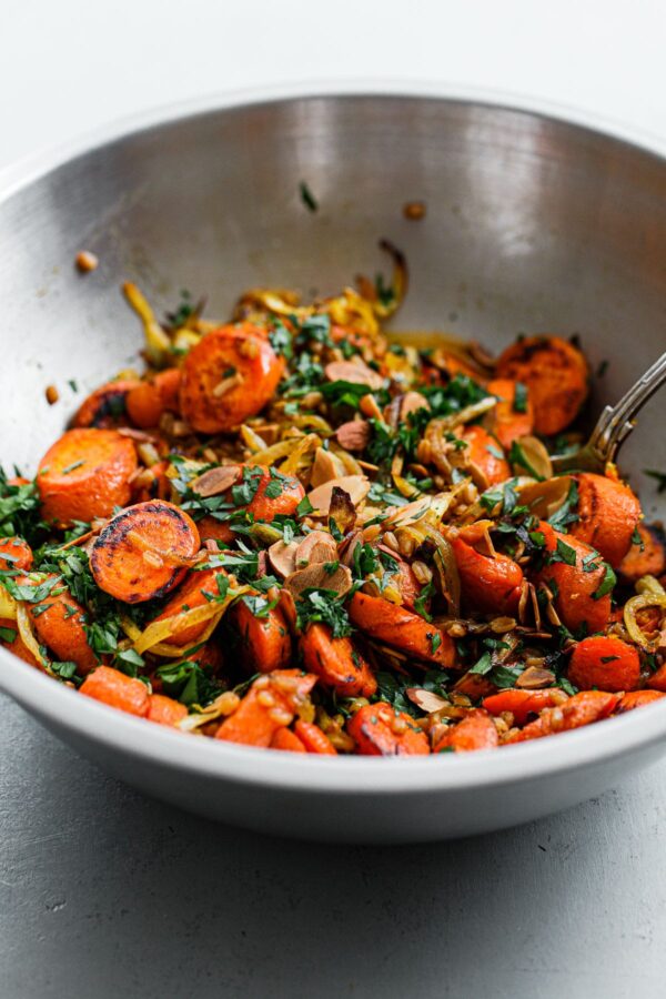 Roasted Carrots, Herbs, and Sliced Almonds in Stainless Steel Bowl