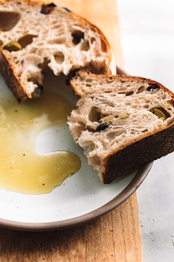 Dipping Olive Sourdough into Olive Oil