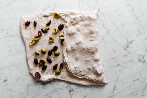 Laminating Olives into Sourdough