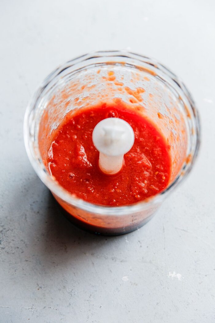 Pureed Canned Tomatoes in Food Processor Bowl