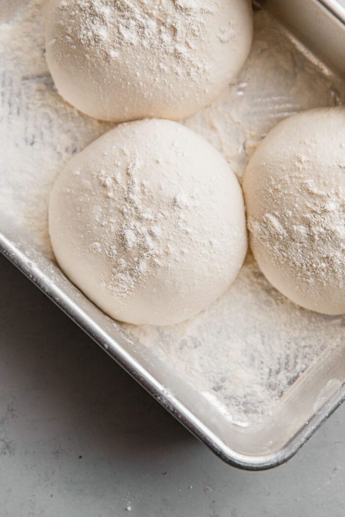 Sourdough Pizza Dough Balls in Proofing Container